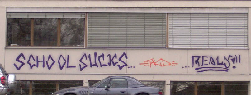 school sucks...really. graffiti tags on kuengenmatt schoolhouse in zurich switezrland. schulhaus küngenmatt zürich wiedikon