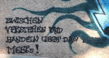 'zwischen verstehen und handeln liegt das meer'. graffiti küsnacht zürich schweiz