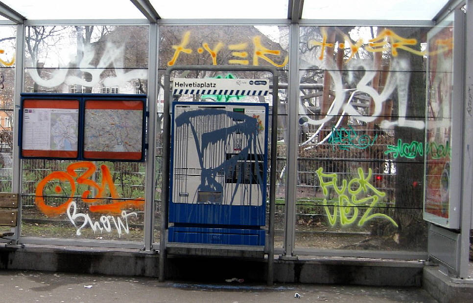demolished and sprayed over bus station in zurich switzerland after anti-police demo. eingefärbte vbz-bushaltestelle in zürich aussersihl nach der payback reclaim the streets demo vom 22. februar 2010