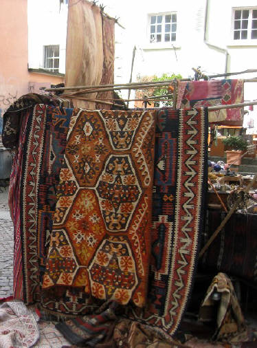 ROSENHOF SQUARE MARKET ZURICH SWITZERLAND. Hand-made clothing, leatherware, carpets, jewelry is sold by dealers from many countries. Food is also available. Open on Saturdays 10 am until  5 pm from March through October and Thursdays 10 am to 8 pm on Thursdays. 