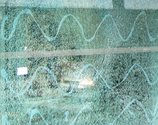 One of the armored glass windows of the Swiss  Cantonal Bank, corner of Zurlinden street and Zweier street, after a night-time attack. The destroyed armored glass window is covered with an emergency window. Notverglasung ber einer der zerstrten Panzerglasscheiben der ZKB Zrcher Kantonalbank, Ecke Zurlindenstr. und Zweierstrasse Zrich Wiedikon, Kreis 3, nach dem nchtlichen Anschlag vom 4. Juli 2009, anslsslich einer 'Anti-Bullen Demo'